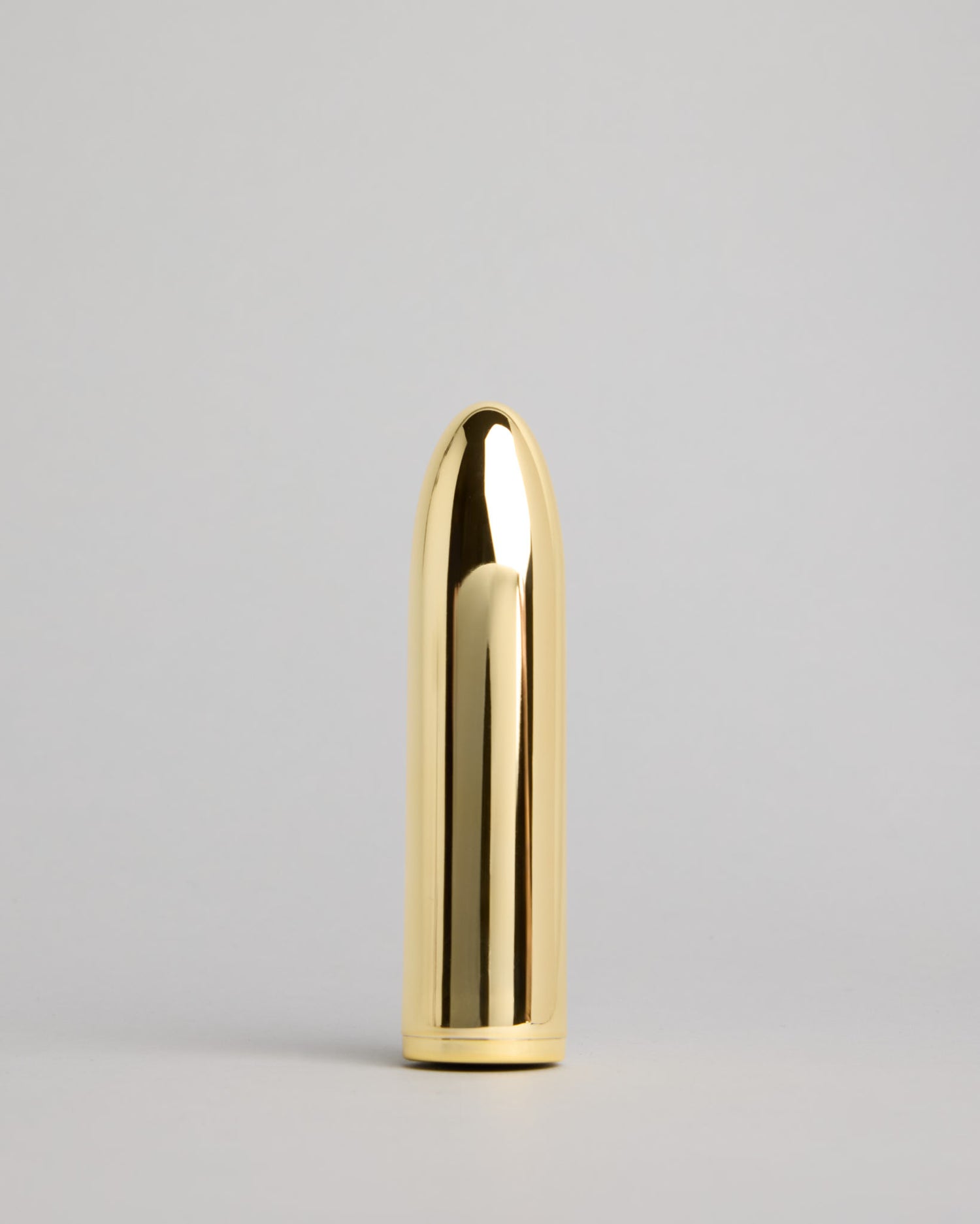 Front view of the gold Belle Mini Massager – elegant compact design for modern wellness