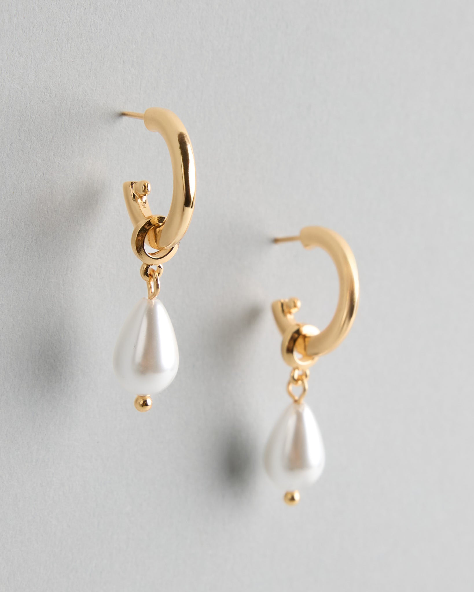 The Lexie Pebble Gold-Plated Earrings – minimalist round gold studs with organic shape by SELF Seductions