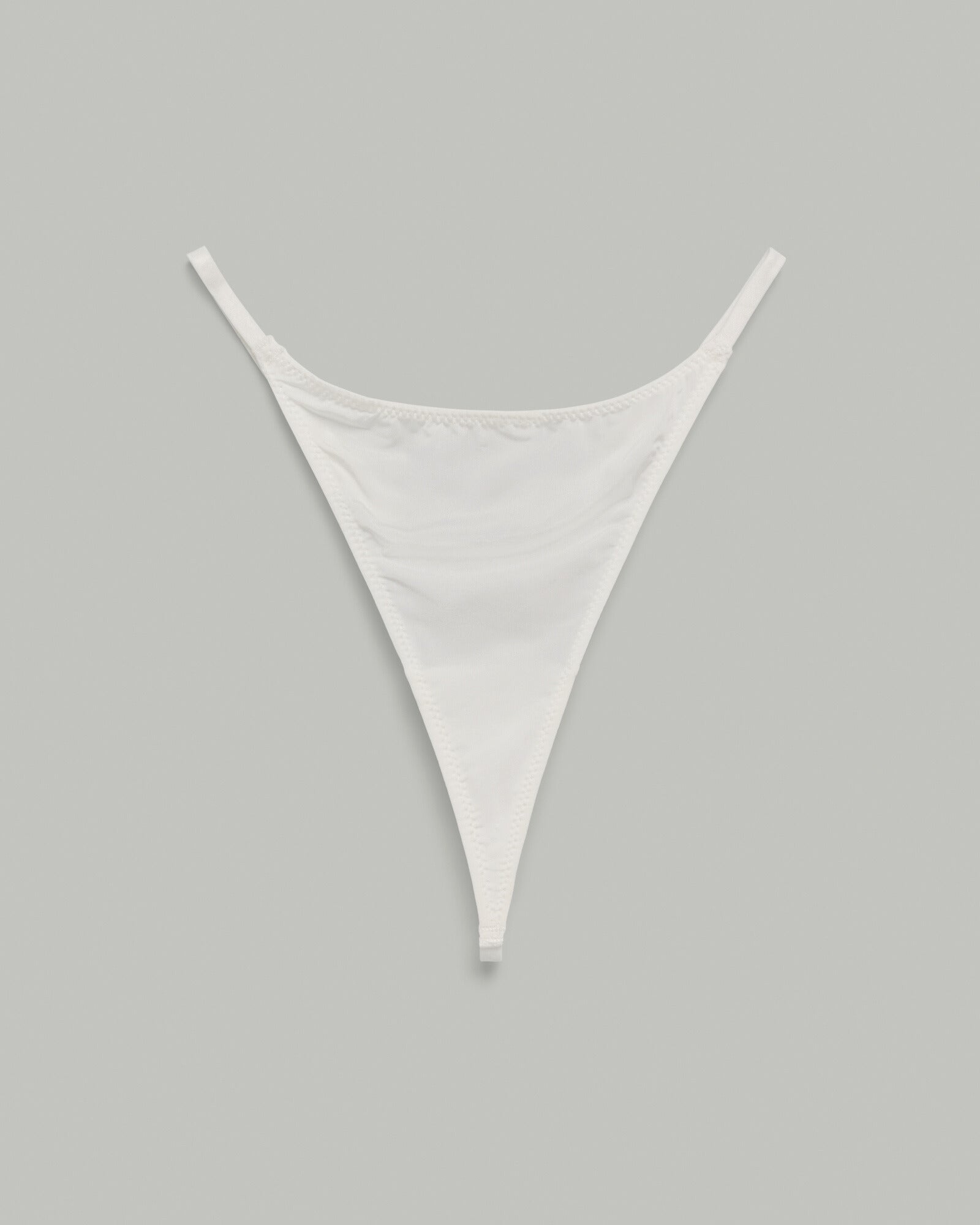 Front view of The Lilly Crystal V Thong – sleek white stretch jersey design with minimal fit by SELF Seductions