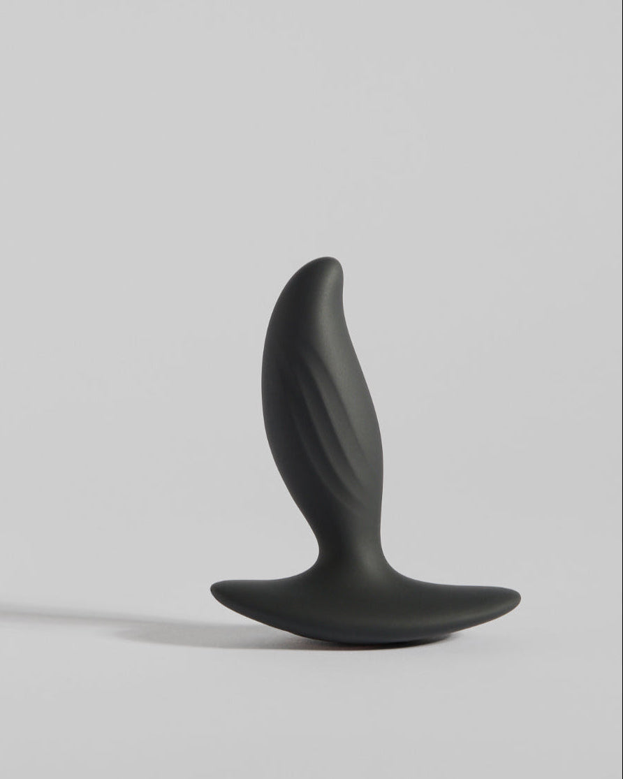 Sculptural black wellness design with smooth contours and modern matte finish by SELF Seductions front