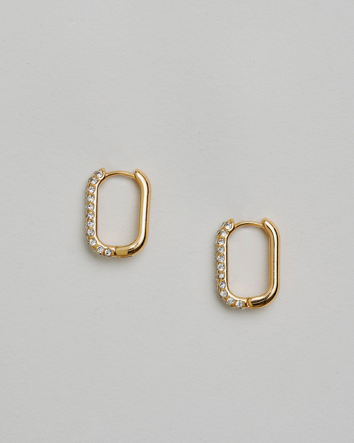 The Allegra Gold-Plated Crystal Hoop Earrings – rectangular gold hoops with pavé crystal detailing by SELF Seductions
