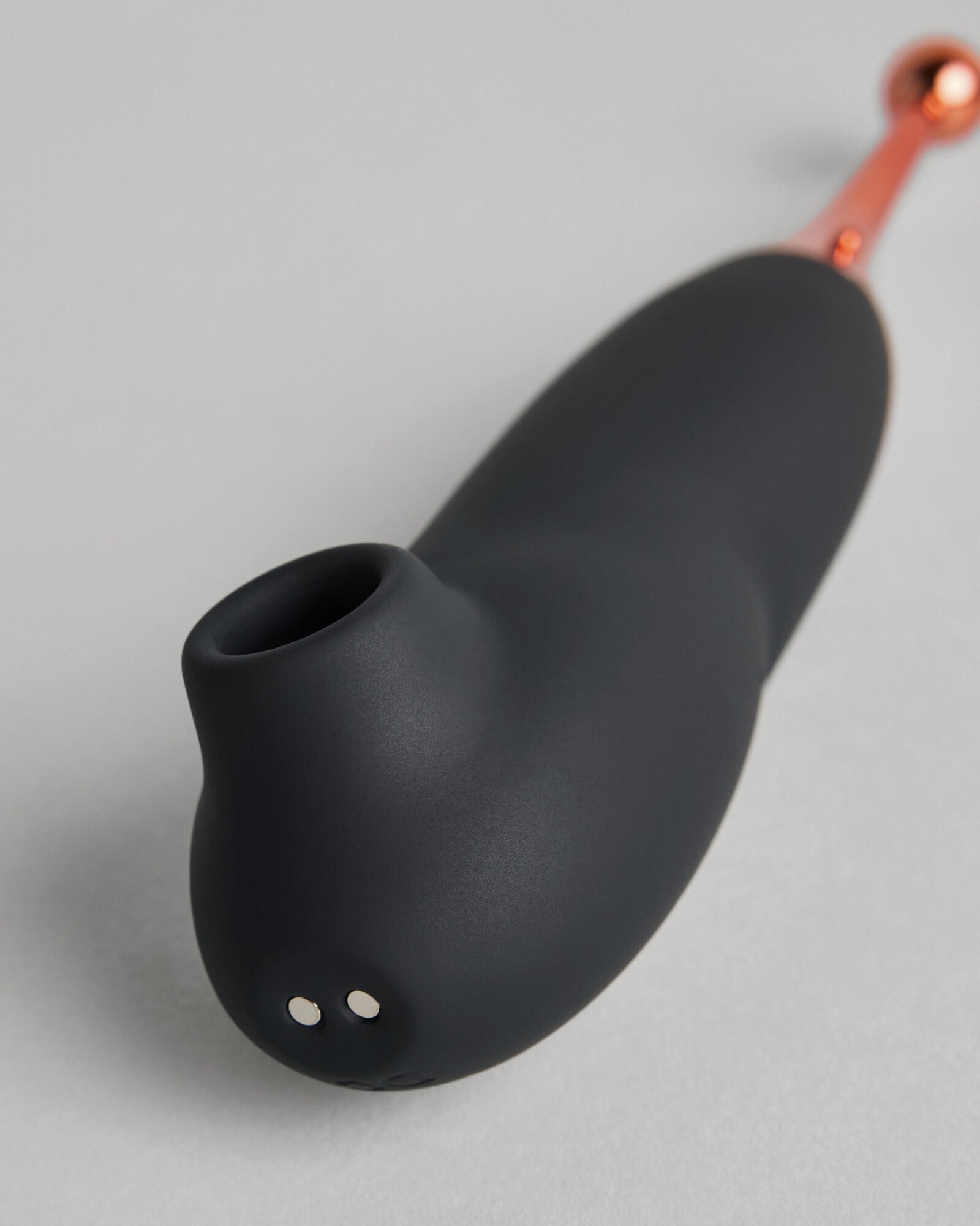 SELF Seductions black touch-free wellness device with refined sculptural design