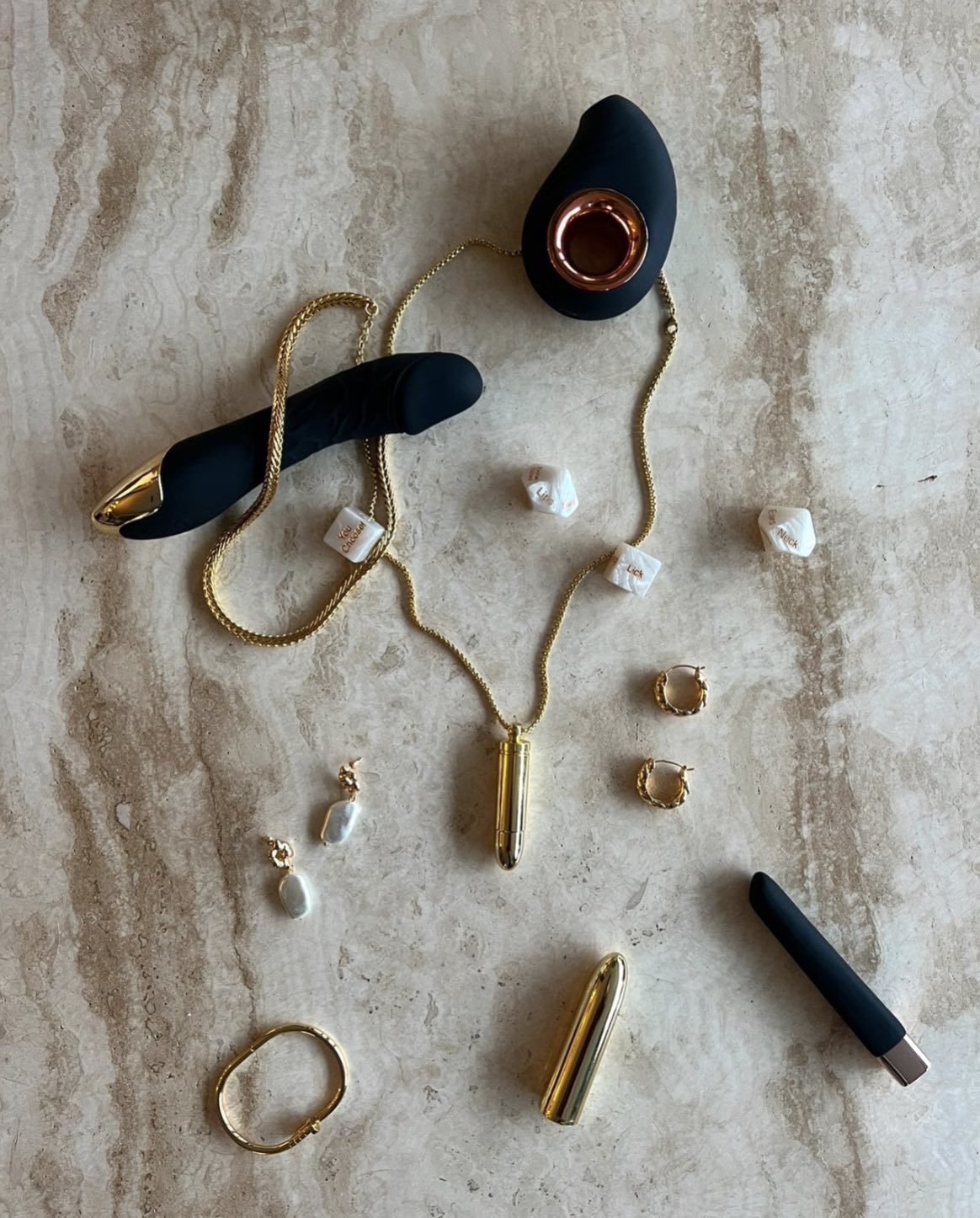 Nikita Sweet Serenity Wellness Device styled with gold accessories – modern and sophisticated SELF Seductions aesthetic