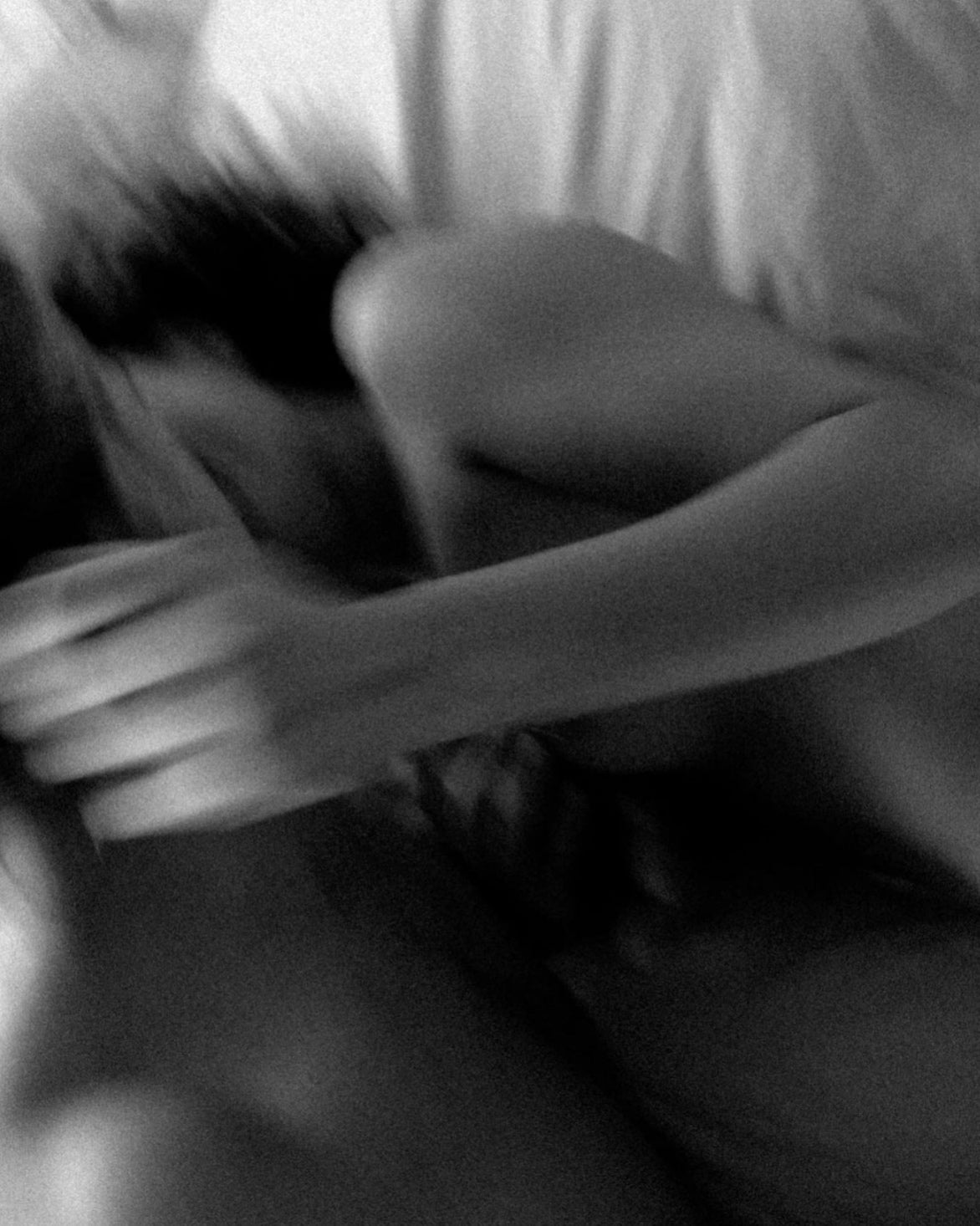 a couple kissing and being intimate showing love