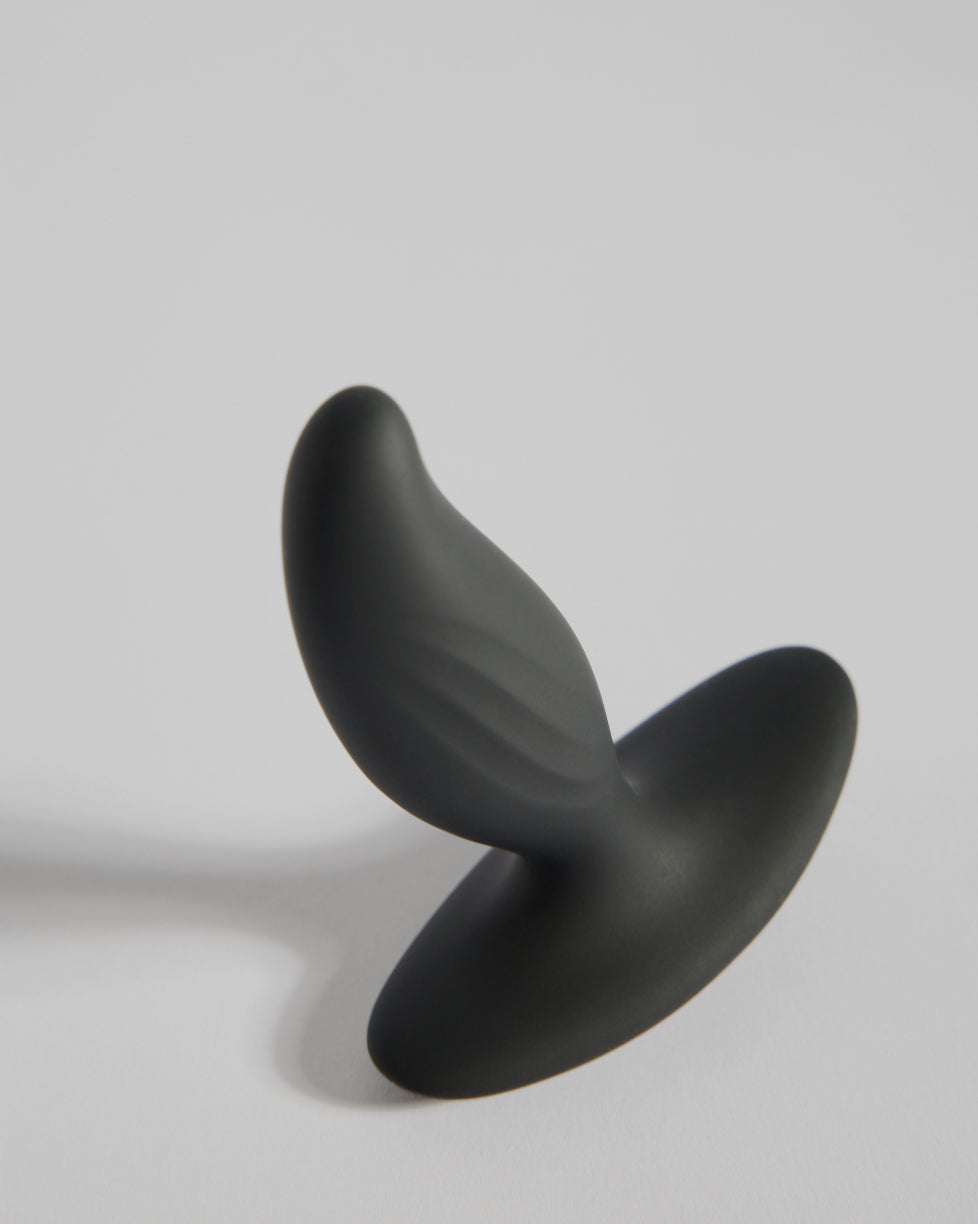 Sculptural black wellness design with smooth contours and modern matte finish by SELF Seductions tilted