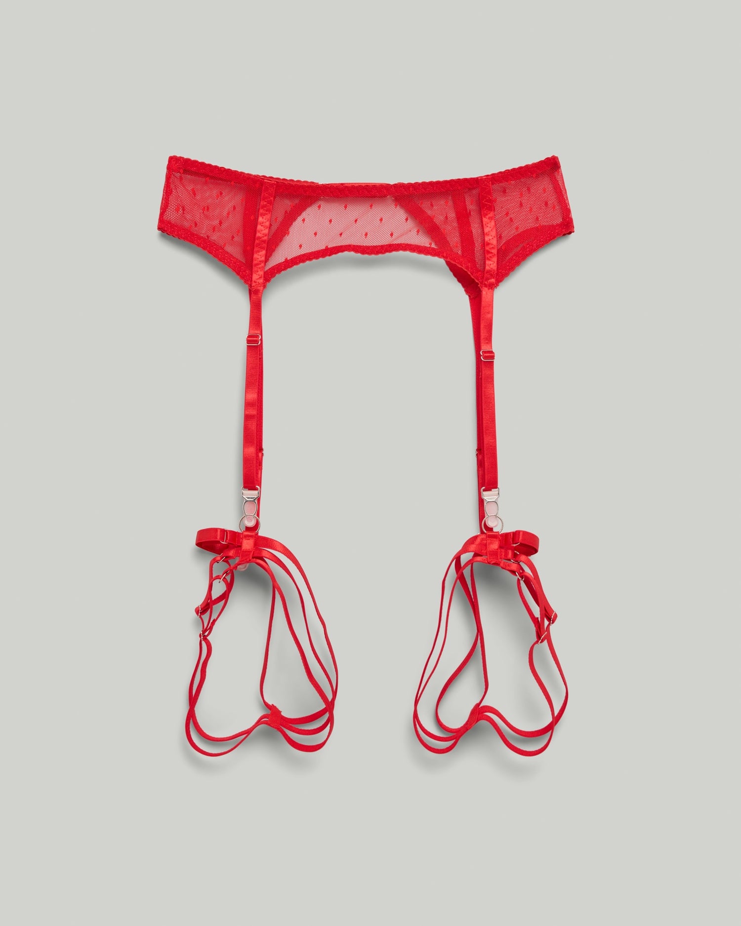 Red sheer mesh suspender belt with delicate dot texture and adjustable straps from the Bianca lingerie collection by SELF Seductions.